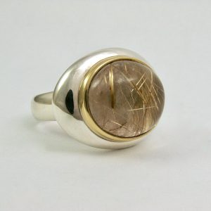 Silver chunky polished ring with large oval rutilated quartz set in 18carat gold