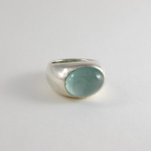 smooth chunky signet ring with large oval cabochon aquamarine