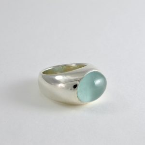 smooth chunky signet ring with large oval cabochon aquamarine