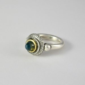 Round Sapphire gold an silver dimpled ring