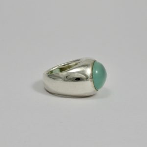 smooth chunky signet ring with large oval cabochon andean opal